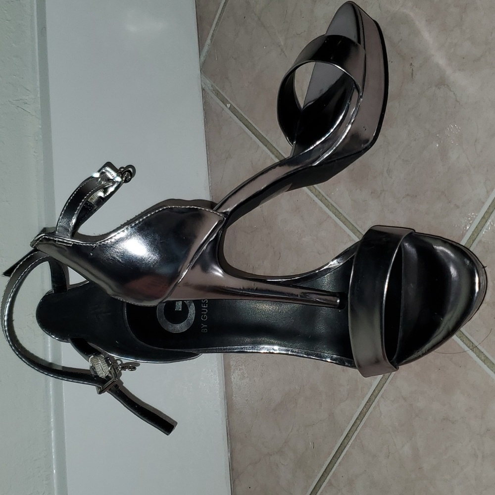 GUESS Silver High heels. Size 7.5 ,worn twice.